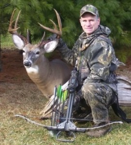 author posing with buck shot using crossbow